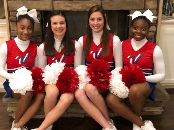 Cheerleaders participate in Disney parade